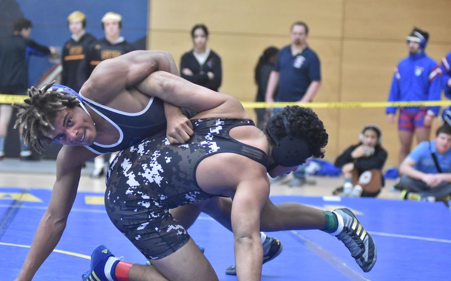 Rota’s Jonathan King, left, defeated Stuttgart’s Sharif Elmas at 175 pounds Friday, Feb. 9, 2024, at the DODEA European Wrestling Championships at Wiesbaden, Germany.