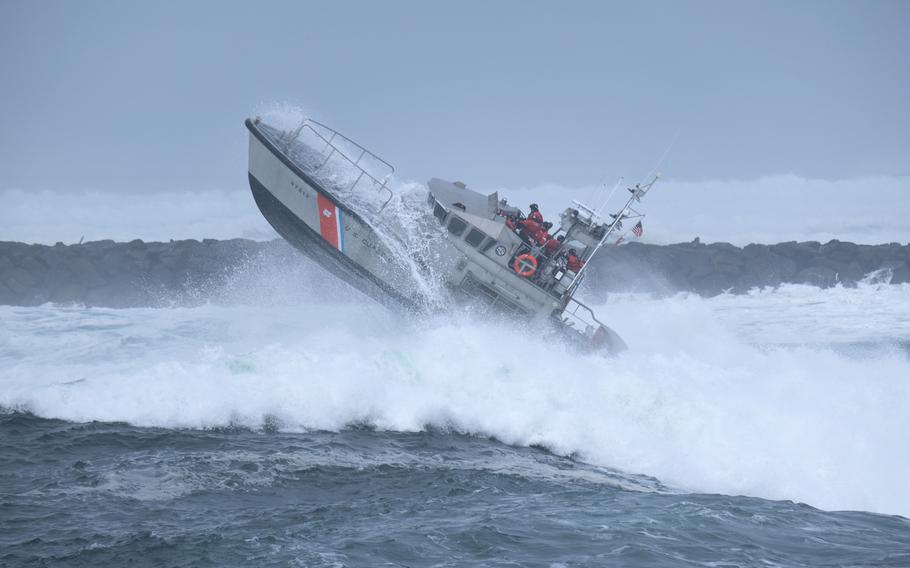 The crew of a vessel from Coast Guard Station Umpqua River, Winchester Bay, Ore., conducts heavy-weather surf training in the bay on March 15, 2022.  