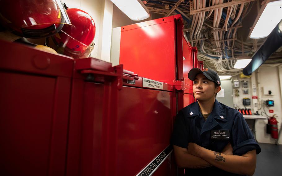 Hull Maintenance Technician 2nd Class Jondanae Garza poses for a portrait in Repair Locker 1A aboard the USS Gerald R. Ford CVN-78 on Friday, Oct. 7, 2022.