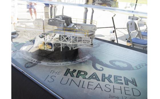 A model of the disorientation research device nicknamed “The Kraken” is displayed at the dedication ceremony for the Captain Ashton Graybiel Acceleration Research Facility at Naval Medical Research Unit Dayton, June 17, 2016 on Wright-Patterson Air Force Base, Ohio. The Kraken, named for a mythical sea monster and which is housed at the facility, allows researchers to create the most realistic motion simulations ever seen, using all six degrees of freedom and up to three G's of force. (U.S. Air Force photo by R.J. Oriez/Released)