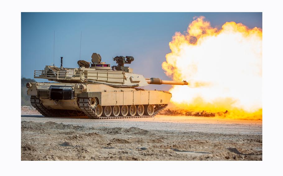 Soldiers from 1st Battalion, 81st Armor Regiment, 194th Armored Brigade fire an M1 Abrams main battle tank on Fort Moore, Ga., March 14, 2024. 