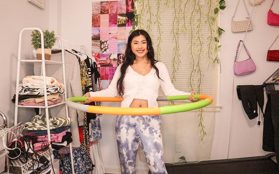 Angie Wang with a weighted hula hoop.