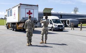 U.S. Air Force Staff Sgt. Connor Morris, a medical technician assigned to the Ohio National Guard’s 180th Fighter Wing, trains on medical evacuation transportation vehicles, alongside a members of the Kadena Air Base Critical Care Air Transportation Team, July 20, 2023 at U.S Naval Hospital Okinawa, Japan. Approximately 30 members of the 180FW Medical Group are working at the hospital as part of Comprehensive Medical Readiness Program (CMRP) training requirements and to assist with patient care throughout various sections of the hospital. The 180FW Medical Group Airmen conduct daily training in realistic environments and circumstances to ensure they maintain the highest level of proficiency and readiness for worldwide deployment. (U.S. Air National Guard Photo by Senior Master Sgt. Beth Holliker).