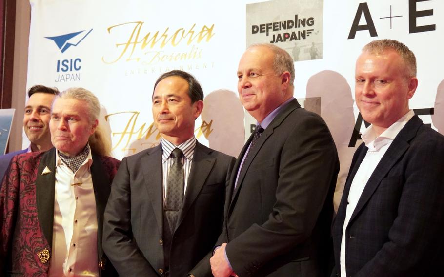 Retired Air Force general Jerry Martinez, second from right, attends a screening of his new show, "Defending Japan," at the New Sanno Hotel in Tokyo, Tuesday, Feb. 27, 2024.