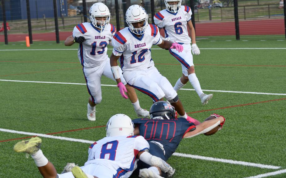 Lakenheath Lancers’ Ryuu Flynn stretches to gain a few extra yards after contact against the Ramstein Royals’ defense. 