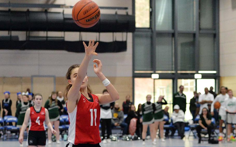 American Overseas School of Rome’s Natalia DiMatteo shoots the game-winning free-throw in the Division II championship game at the DODEA-Europe basketball finals in Ramstein, Germany, Feb. 18, 2023. AOSR defeated Naples 26-25 to take the title.