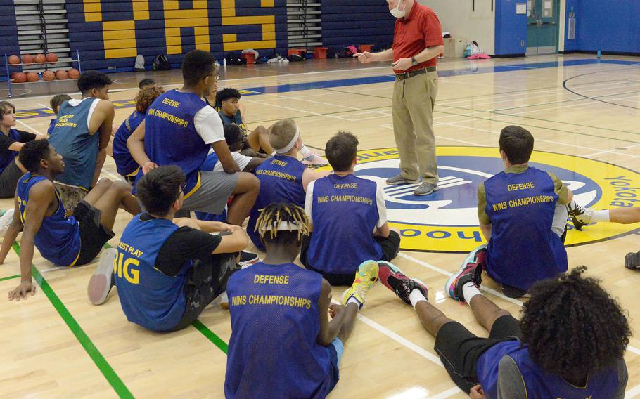 John Thek, who coached Yokota's boys varsity for 15 years in the 1980s and 1990s, goes over the fundamentals of pressure defense.