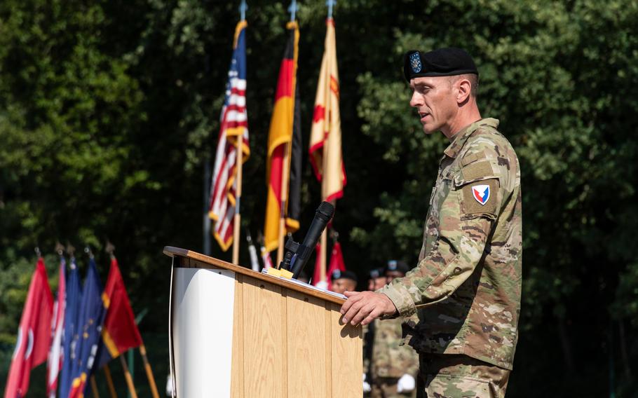 Lt. Col. Jeremy McHugh speaks at a ceremony in Kaiserslautern, Germany, on Friday, July 22, 2022, during which he passed command of U.S. Army Garrison Rheinland-Pfalz to Col. Reid E. Furman. McHugh had been acting commander of the garrison for eight months.