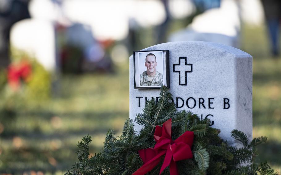 Volunteers participate in the 32nd Wreaths Across America Day in Section 60 of Arlington National Cemetery, Arlington, Va., Dec. 16, 2023. 