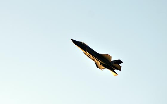 A Royal Australian Air Force F-35A Lightning II flies over Mindil Beach in Darwin, Australia, Thursday, Aug. 25, 2022. 