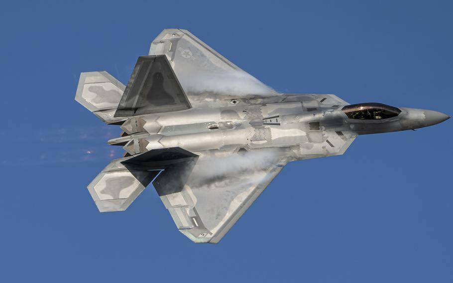 U.S. Air Force Maj. Josh Gunderson, F-22 Demo Team commander, conducts a practice show over Joint Base Langley-Eustis, Virginia, May 21, 2021.  