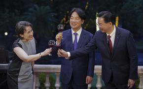 In this photo released by the Taiwan Ministry of Foreign Affairs, Taiwan's new President Lai Ching-te, also known as William Lai, center, new Vice President Bi-khim Hsiao, left, and Foreign Minister Joseph Wu, right, make a toast during a welcome reception for delegations to the Inauguration ceremony for the new president and vice president, in Taipei, Taiwan, Sunday, May 19, 2024.