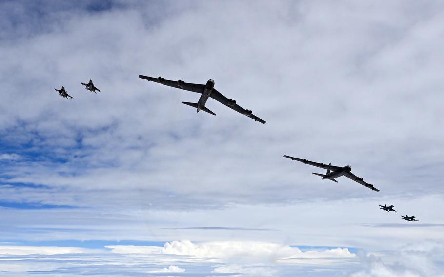 U.S., Japanese and South Korean jets flying in formation.