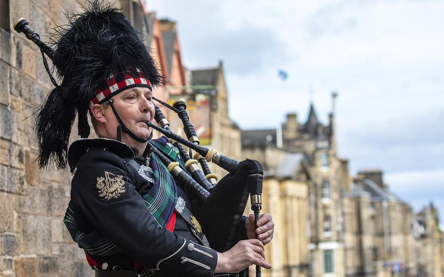 A bagpiper in traditional uniform performs in Edinburgh, Scotland. August is a wonderful time to hear traditional Scottish instruments such as bagpipes at various events in Scotland such as The Royal Edinburgh Military Tattoo, through Aug. 23, and Glasgow’s International Piping Festival, running Aug. 11-17.