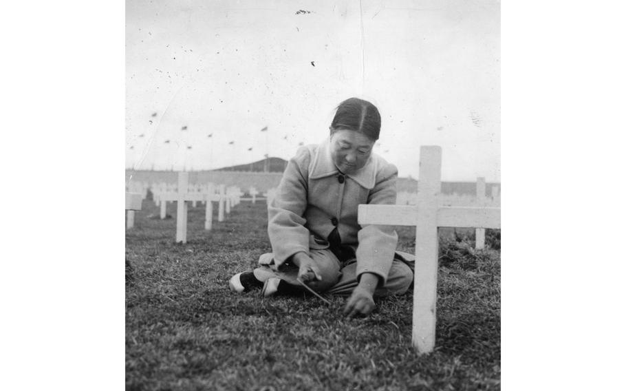 A Korean woman pulls weeds among the gravesites at the world’s only remaining United Nations cemetery in Busan, South Korea, sometime in early 1955.