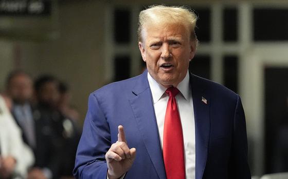 Former President Donald Trump speaks to members of the media before entering the courtroom at Manhattan criminal court, Monday, May 6, 2024, in New York. (AP Photo/Julia Nikhinson, Pool)