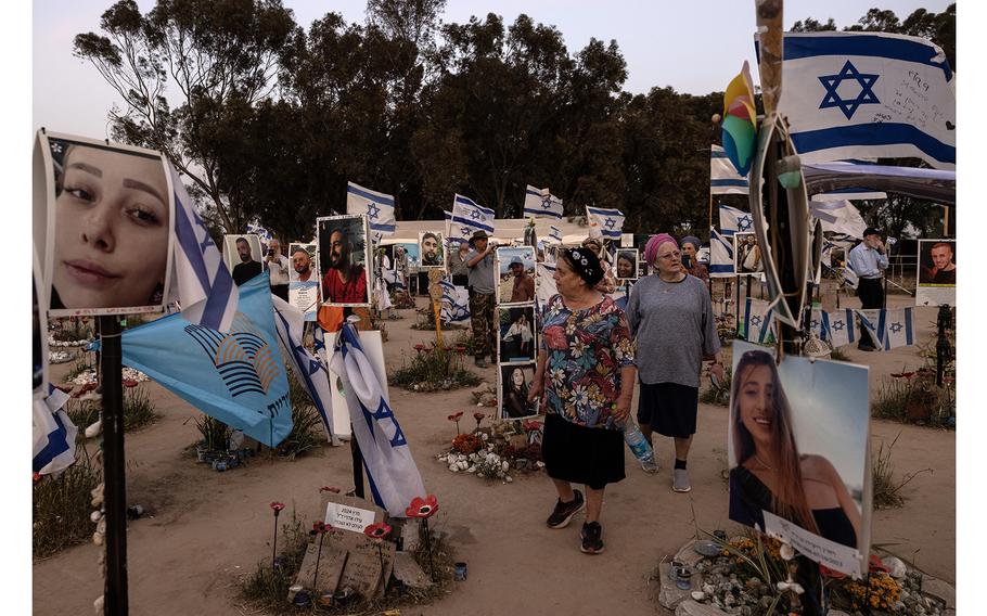Visitors to the memorial site of the Tribe of Nova trance music festival, where on Oct. 7, Hamas militants killed 360 people and dragged another 40 into Gaza, according to Israeli authorities.