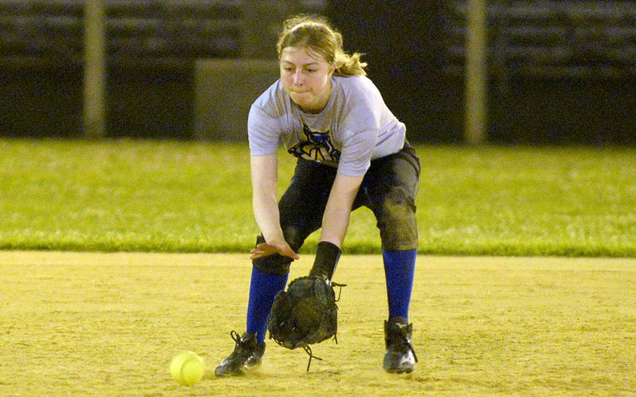 Yokota shortstop Zaylee Gubler fields a ground ball against Kubasaki during Friday's softball doubleheader. The Dragons swept the Panthers 19-18 and 14-7.