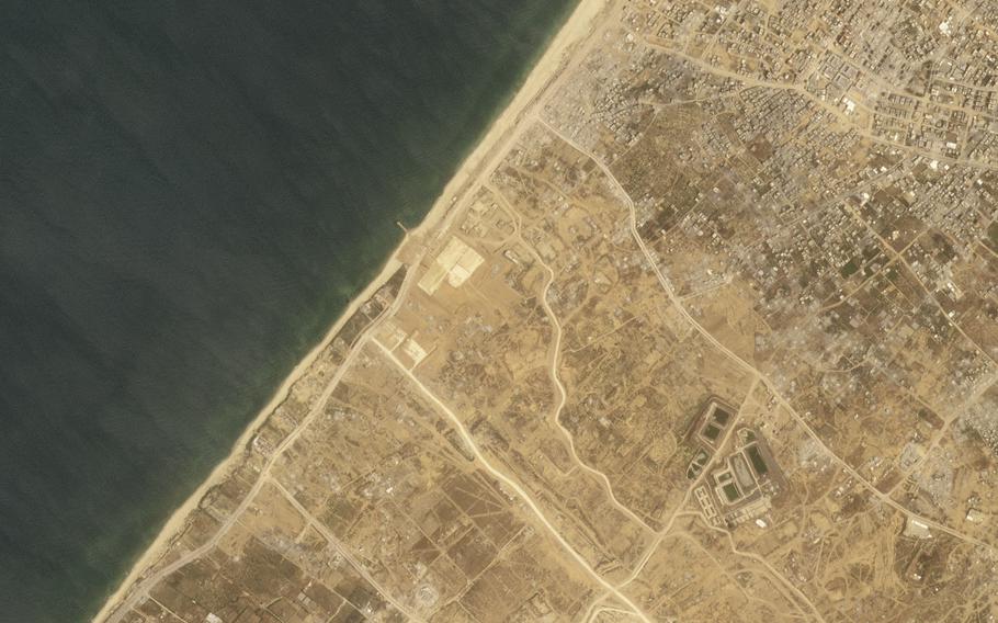 A satellite picture shows the construction of a new aid port near Gaza City, Gaza Strip, on Wednesday, April 24, 2024. 