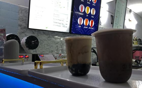 A Classic Babe's bubble tea and children's chocolate milk with boba pearls at Babe's Boba Tea in Kaiserslautern, Germany.

