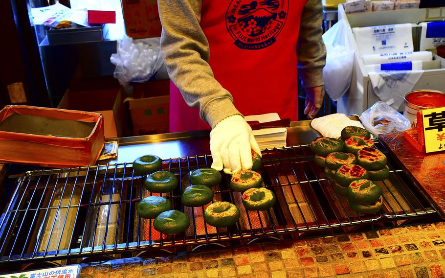 Mochi is made with mugwort at Oshino Hakkai, a UNESCO site at the base of Mount Fuji, April 27, 2023.