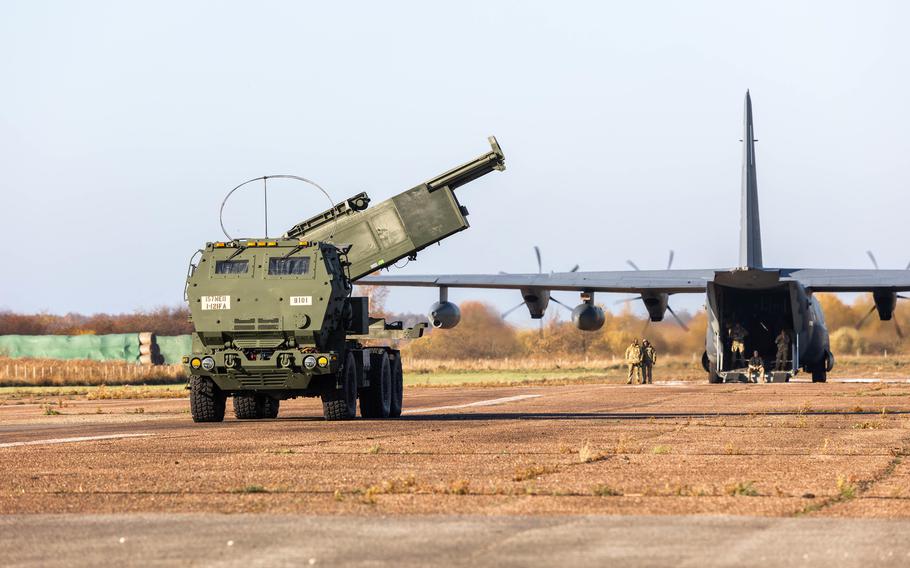 A High Mobility Artillery Rocket System leaves a U.S. aircraft during an exercise in Riga, Latvia, Oct.25, 2021. U.S. Army Europe and Africa deployed soldiers and two HIMARS systems to Latvia on Sept. 26, 2022, to demonstrate rapid artillery deployment to NATOs eastern flank.