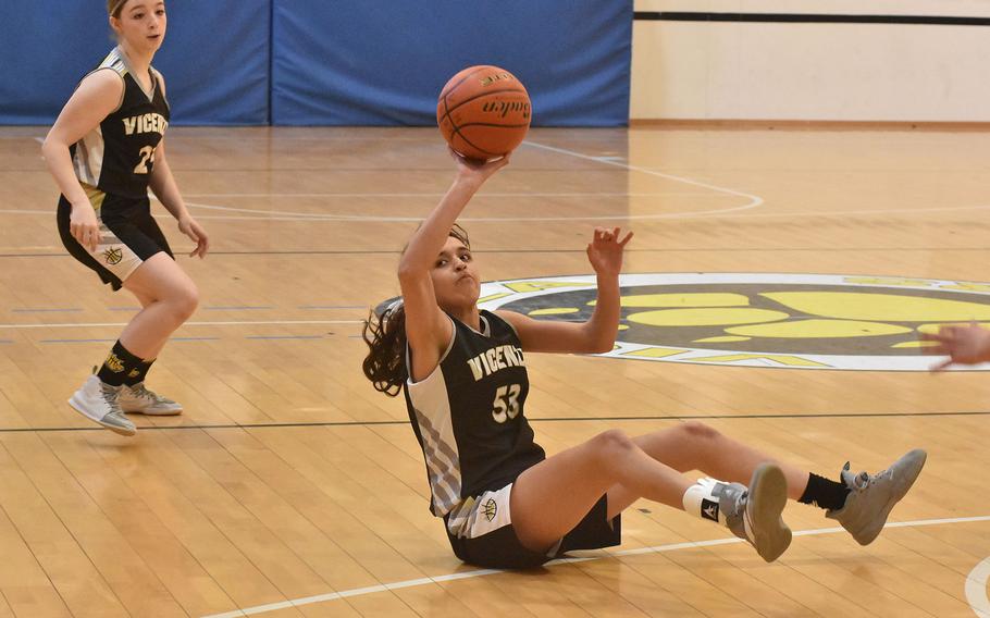 Vicenza's Gabriela Sanchez successfully makes a pass while sitting on the court during the DODEA-Europe Divisoin II basketball championships on Thursday, March 3, 2022.