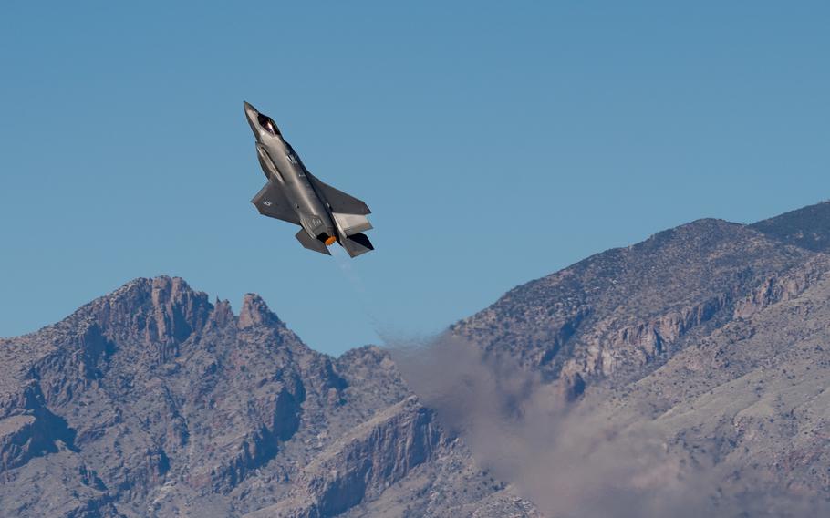 An Air Force F-35 Lightning II flies over Davis-Monthan Air Force Base, Ariz., on March 4, 2023. The F-35A Lightning II Demonstration Team is part of the first operational F-35A wing for the Air Force, the 388th Fighter Wing, and flies demonstrations at air shows around the world.