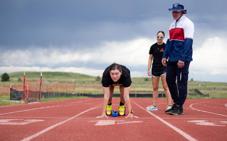 An Army service member getting ready to run for track practice.