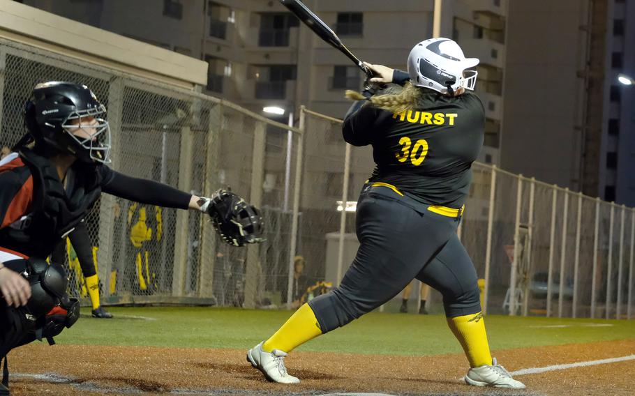 Kadena's Jana Hurst clubs a double to center field against Nile C. Kinnick during Friday's knockout-round game of the All-DODEA-Japan softball tournament. The Panthers eliminated the Red Devils 14-0.