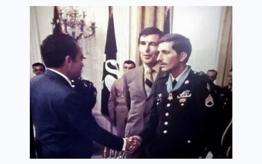Vietnam veteran Franklin D. Miller shakes hands with former President Richard Nixon during a Medal of Honor award ceremony at the White House on June 5, 1971.