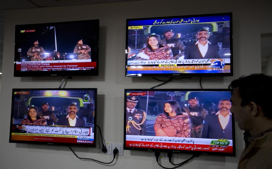 Television screens show a broadcast of captured Indian pilot Wing Commander Abhinandan Varthaman’s handover to Indians at the Wagah border in Pakistan, on March 1, 2019. Pakistan on Tuesday, Nov. 23, 2021, a day after Varthaman was awarded India’s third-highest honor., rejected India’s claim that Varthaman shot down a Pakistani F-16 fighter plane in 2019.