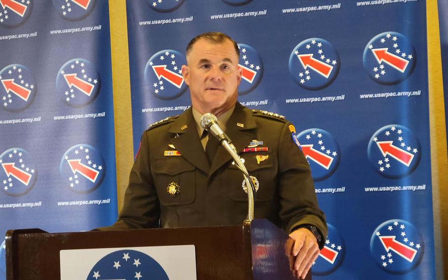 Gen. Charles Flynn, commander of U.S. Army Pacific, speaks with reporters during the Land Forces of the Pacific symposium at Waikiki Beach in Honolulu, Hawaii, Tuesday, May 17, 2022.