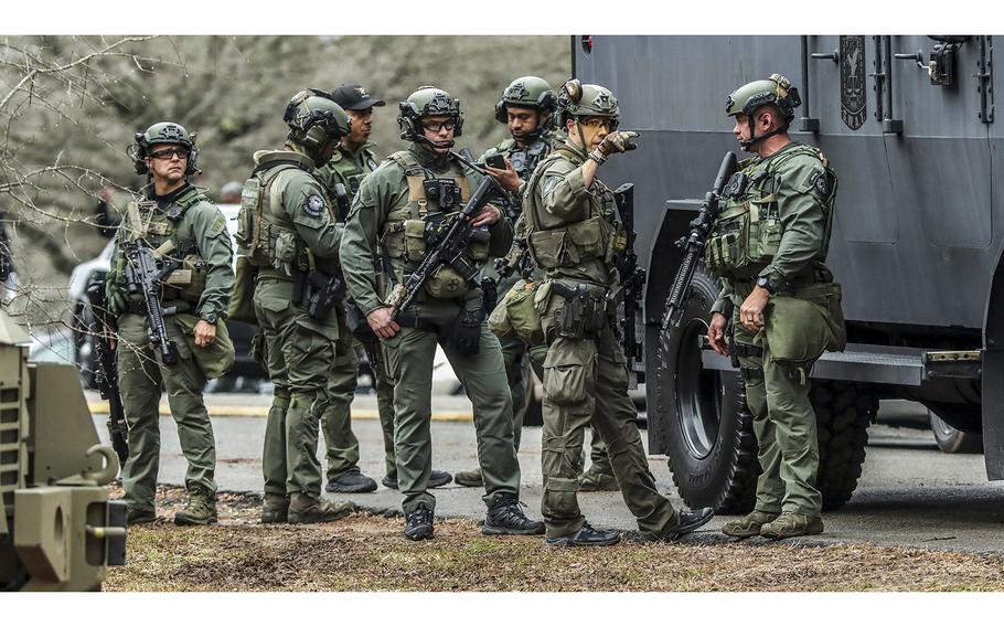 DeKalb and Atlanta SWAT members leaving from Gresham Park command post. Georgia state troopers helping conduct a “clearing operation” at the site of Atlanta’s planned public safety training center exchanged gunfire with a protester on Jan. 18, 2023, leaving the protester dead and one trooper wounded, according to the Georgia Bureau of Investigation. 