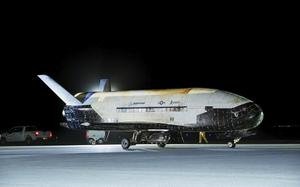 A space plane lands at a Space Force base.