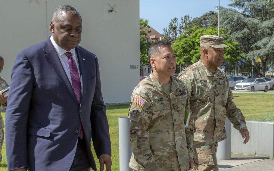 Security Assistance Group Ukraine commander Lt. Gen. Antonio Aguto Jr., center, walks with Defense Secretary Lloyd Austin and U.S. Army Europe-Africa commander Gen. Darryl Williams at USAREUR-AF headquarters at Clay Kaserne in Wiesbaden, Germany, on June 14, 2023. Aguto is reportedly spending extensive time in Kyiv as a war adviser, according to a New York Times report. 