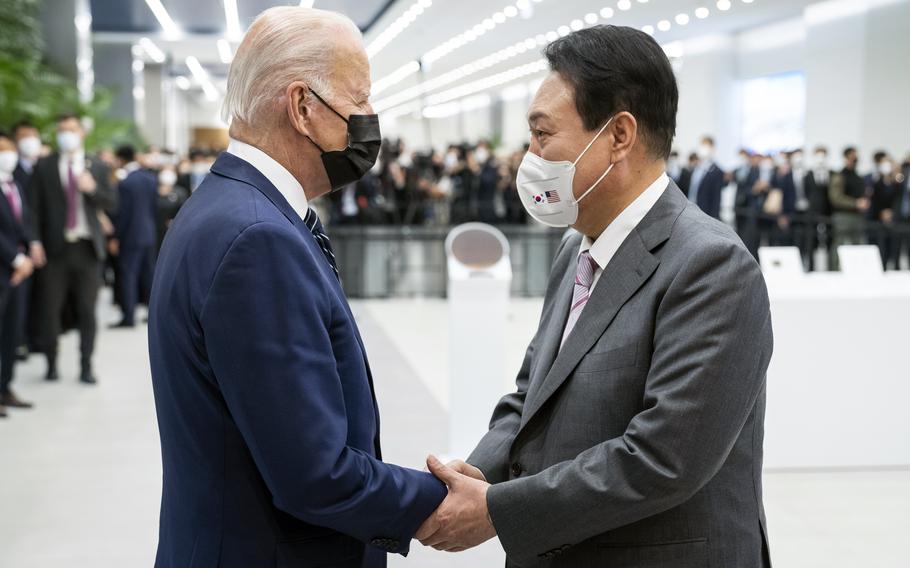 President Joe Biden greets South Korean President Yoon Suk Yeol in Pyeongtaek, South Korea, May 20, 2022.