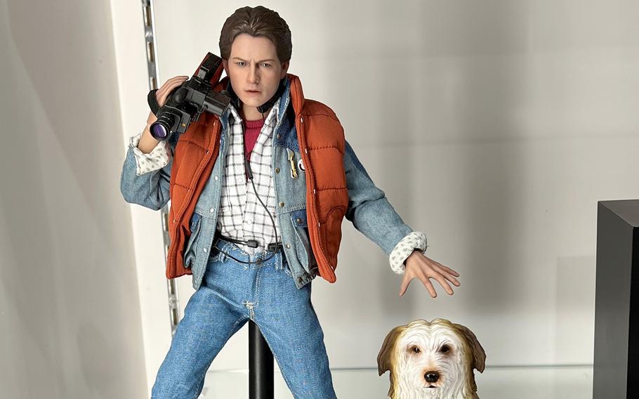 Realistic but scaled-down versions of Marty McFly and Einstein from the movie “Back to the Future” retail for about $270 at Toy Sapiens in Tokyo.