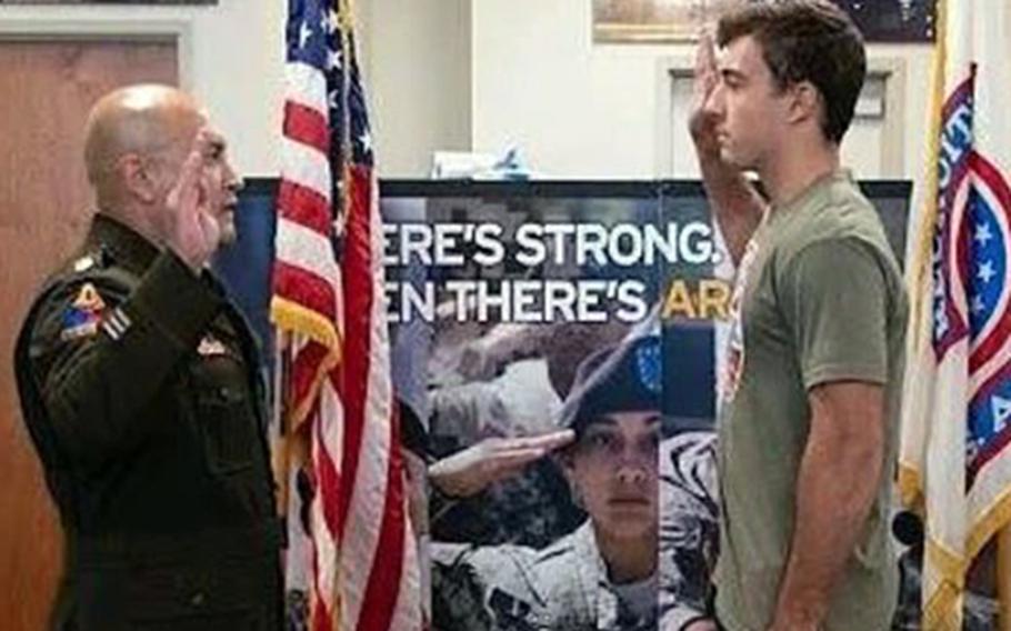 Maj. Miguel Diaz enlists Kheydon Gracie at the Army recruiting office at Huntington Park, Calif. Gracie is the son of Royce Gracie, the first person inducted into the Ultimate Fighting Championships Hall of Fame. 