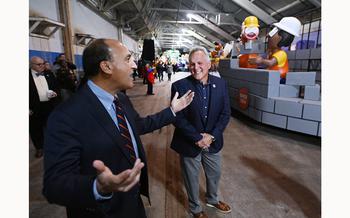 Tony Michaels, President & CEO of the Parade Co., and Chuck Binkowksi, COO of Barton Malow, during a float unveiling in 2023.