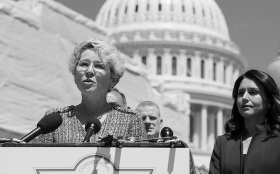 Washington, D.C., May 15, 2019: Former Air Force officer Rep. Chrissy Houlahan, D-Pa., announces the launching of the Servicewomen and Women Veterans Caucus that will focus on women's issues in the military. Former Army officer and caucus co-founder Rep. Tulsi Gabbard, D-Hawaii, looks on at right.

Read the story here: https://www.stripes.com/theaters/us/new-congressional-caucus-to-focus-on-servicewomen-female-vets-1.581093

META TAGS: Servicewomen and Women Veterans Caucus; U.S. Congress; women in the military; Women's History Month; 