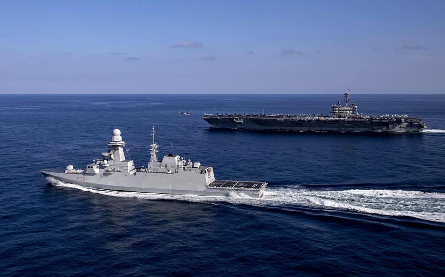 The Italian frigate ITS Virginio Fasan and the aircraft carrier USS George H.W. Bush conduct flight operations in the Mediterranean Sea in March 2023. A European Union mission in the Red Sea that would help protect ships from attacks by Houthi militants in Yemen will be commanded by an Italian admiral, according to media reports.