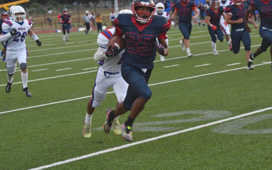 The Lakenheath Lancers' Isaiah Watson returns a kickoff deep into Ramstein territory.