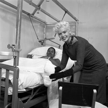Jayne Mansfield jokes around with one of the patients at the Army’s 97th General Hospital in Frankfurt, Germany Oct. 5, 1957. The photographer identified the patient as Thurlo Lyles.