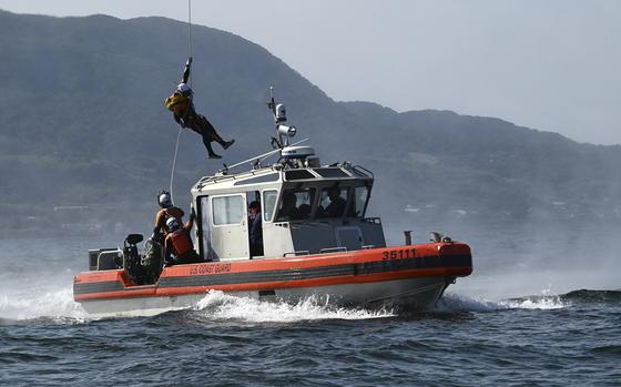 A 35-foot long-range interceptor small boat launched from the U.S. Coast Guard Cutter Kimball takes part in a search-and-rescue exercise in Kagoshima Bay, Japan, on Feb. 14, 2023. According to reports on Saturday, March 18, 2023, the Kimball has returned to its Hawaii home port after a 42-day, 10, 000-nautical-mile Western Pacific patrol.