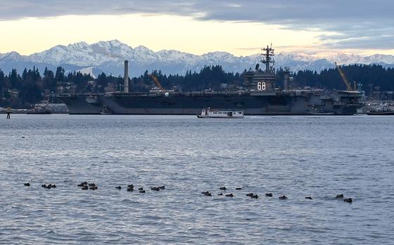 161215-N-SH284-138 PORT ORCHARD, Wash. (Dec. 15, 2016) USS Nimitz (CVN 68) transits Sinclair Inlet as it returns to its homeport, Naval Base Kitsap-Bremerton. Nimitz returns after successfully completing Tailored Ship’s Training Availability and Final Evaluation Problem (TSTA/FEP) Dec. 8. (U.S. Navy photo by Petty Officer 2nd Class Vaughan Dill/Released)