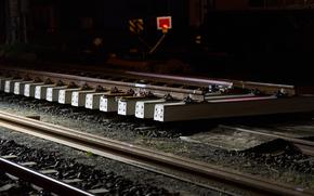 In this undated photo from 2022, damaged concrete rail ties are seen along a railway track in Germany. German Railways has revealed that damaged concrete ties were the primary cause of a train derailment in Garmisch-Partenkirchen on June 3, 2022, according to a recent interim report. 