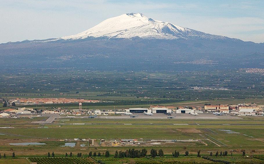 Naval Air Station Sigonella, Sicily, with Mt. Etna in the distance. Surging COVID-19 cases in Sicily triggered tougher coronavirus restrictions for residents, including the U.S. military community.   
