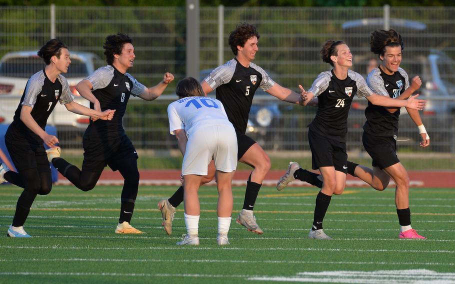 Christian Ingle, second from right, and teammates celebrate his winning goal in the boys Division I final at the DODEA-Europe soccer championships in Ramstein, Germany, May 18, 2023. Stuttgart beat Wiesbaden 2-1 to win the title. 