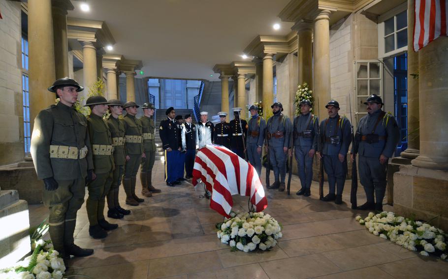 Re-enactors dressed as American and French World War I soldiers join the U.S. European Command Honor Guard during a ceremonial vigil on the 100th anniversary of the selection for the U.S. Tomb of the Unknown Soldier, Oct. 23, 2021 in Chalons-en-Champagne, France. 